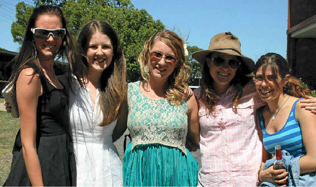Allie Spain, Clare Goodwin, Bernadette Purcell, Anna Birchley and Lydia Wullems have a blast at the races.